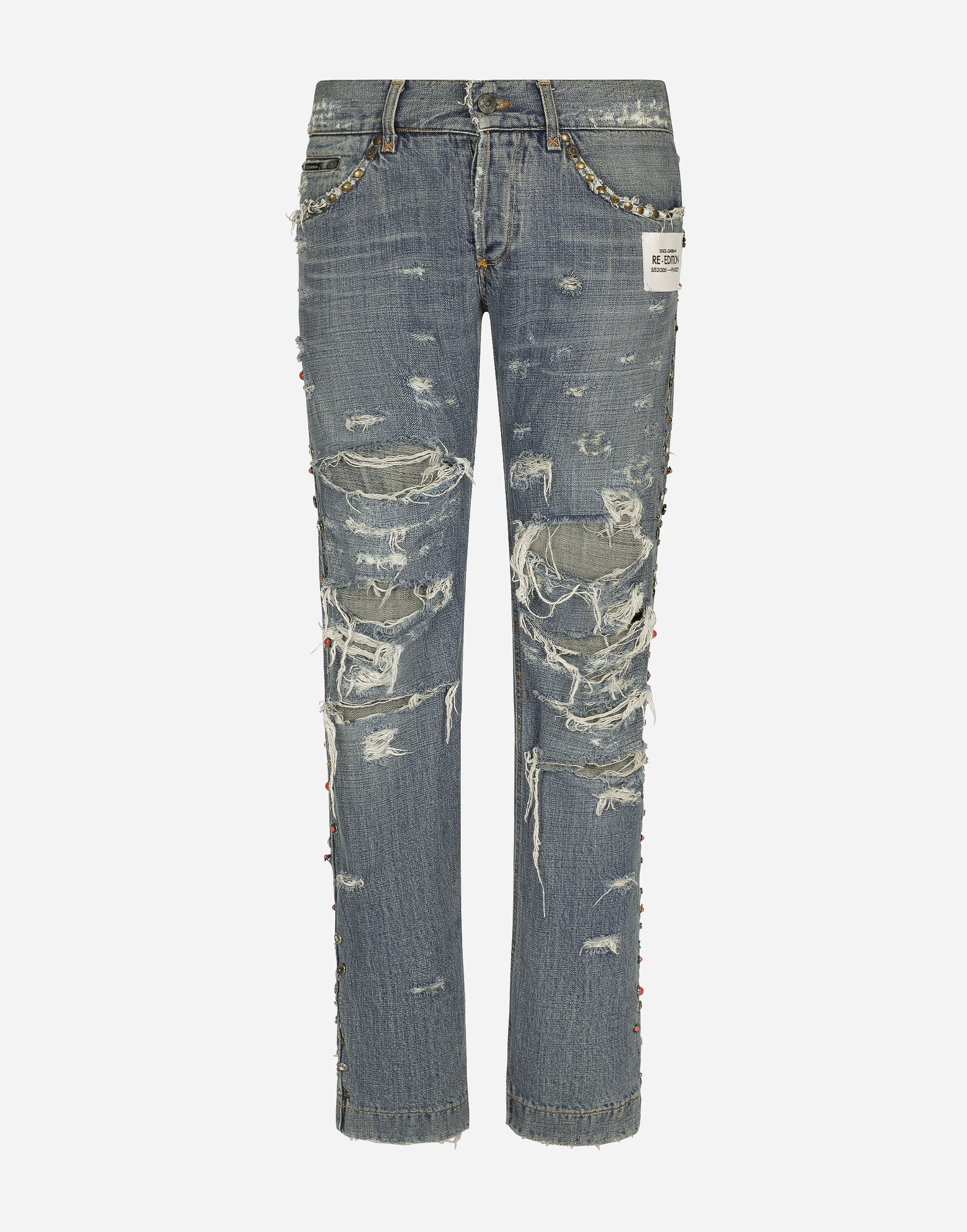 Washed denim jeans with studs and rips